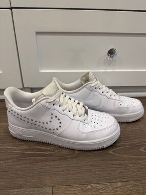 Nike White Low-Top Sneakers with Silver Stud Accents